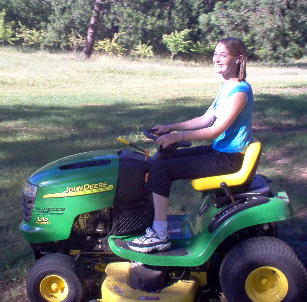 Amelia on a John-Deere Tractor